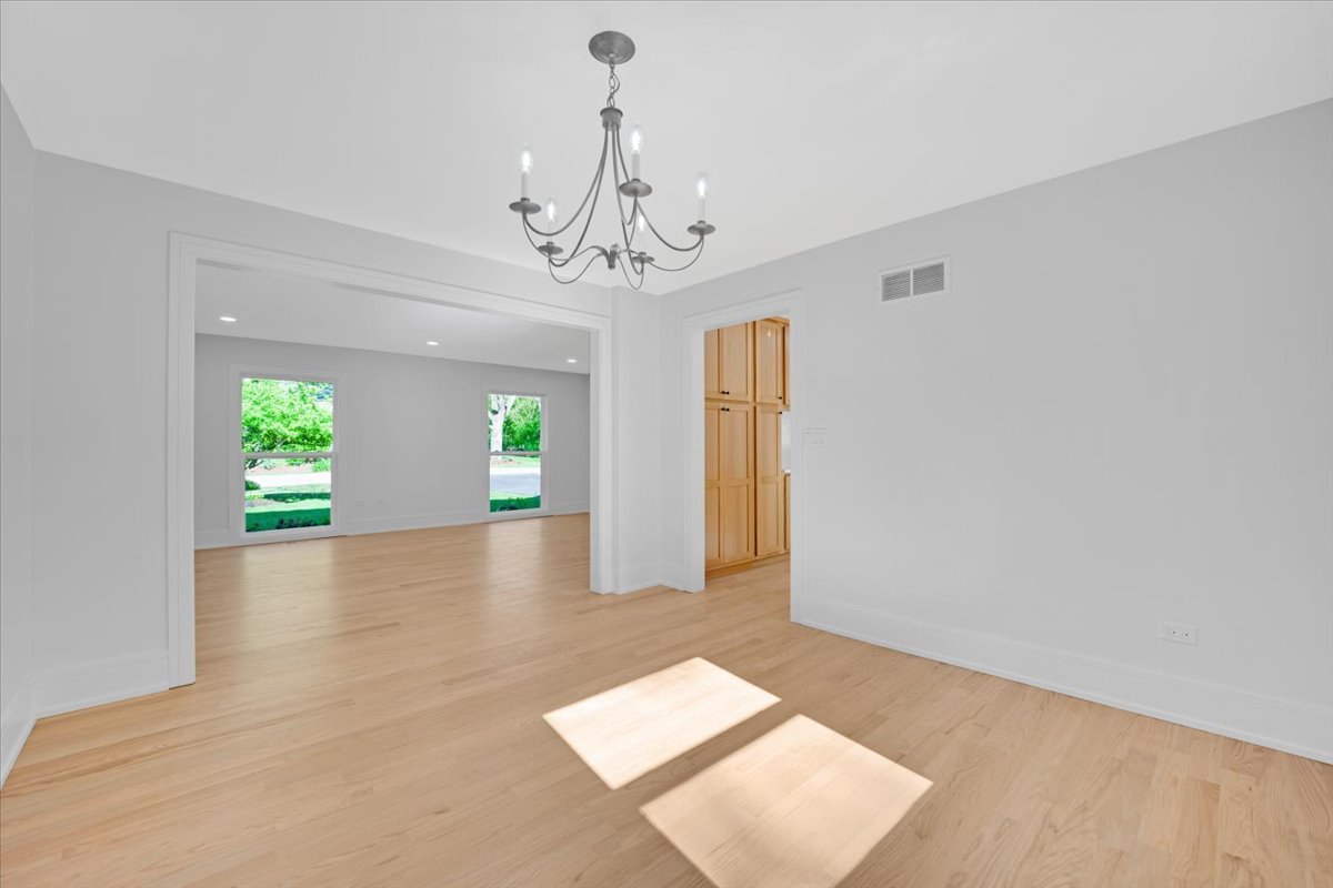 101 Devonshire Road, Unit 1 Tower Lakes, IL 60010 - Photo 11 of 38 a view of a room with window and wooden floor