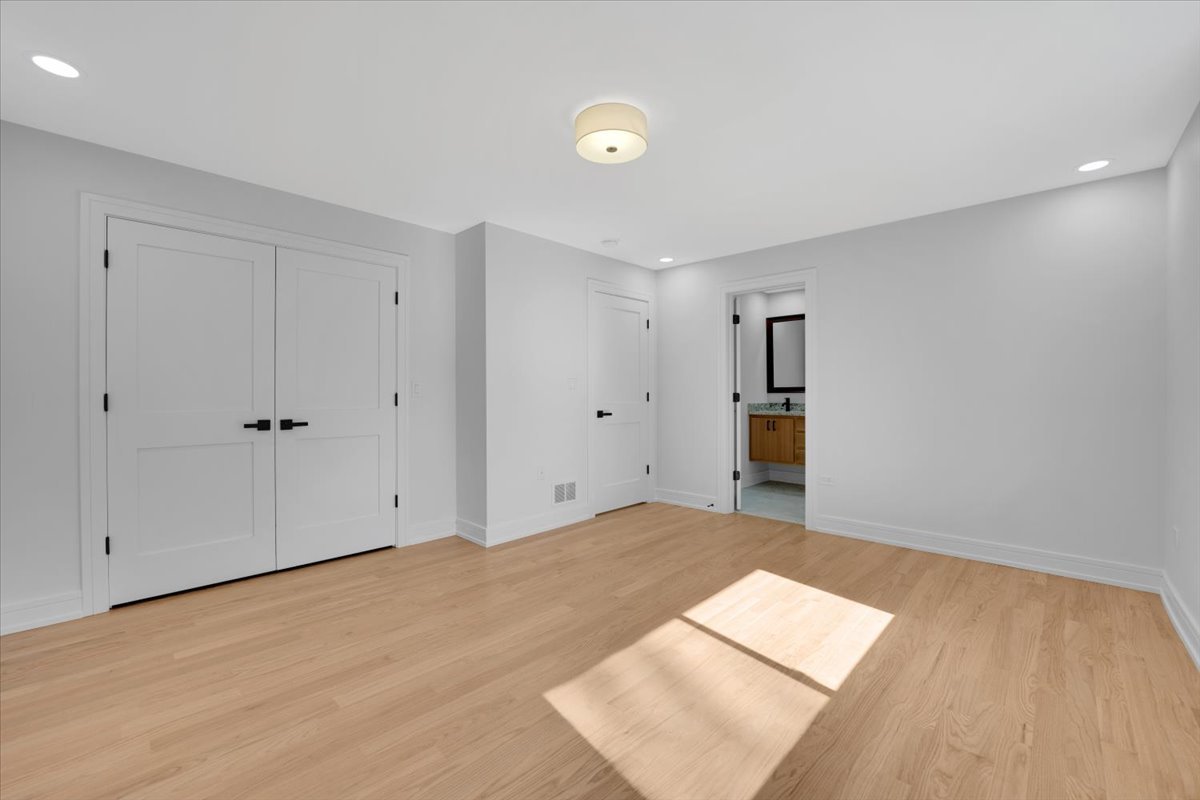 101 Devonshire Road, Unit 1 Tower Lakes, IL 60010 - Photo 18 of 38 a view of empty room with wooden floor