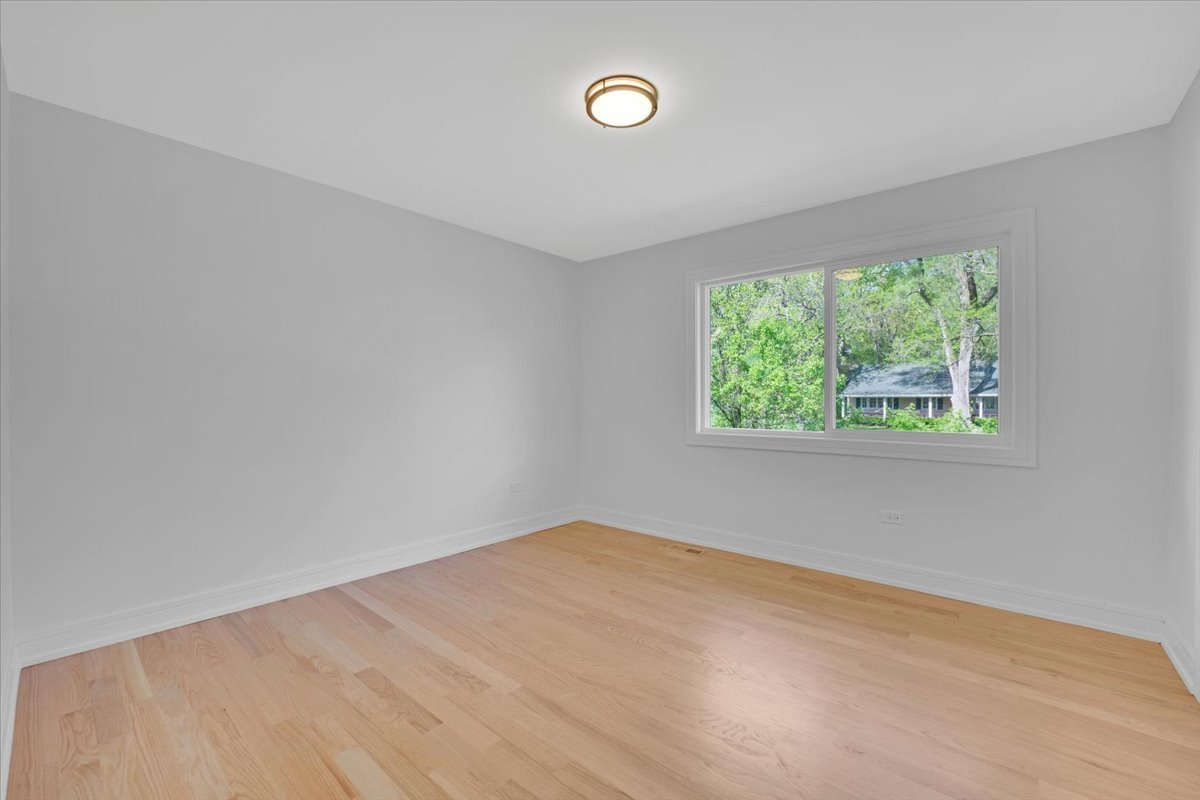 101 Devonshire Road, Unit 1 Tower Lakes, IL 60010 - Photo 21 of 38 an empty room with a window