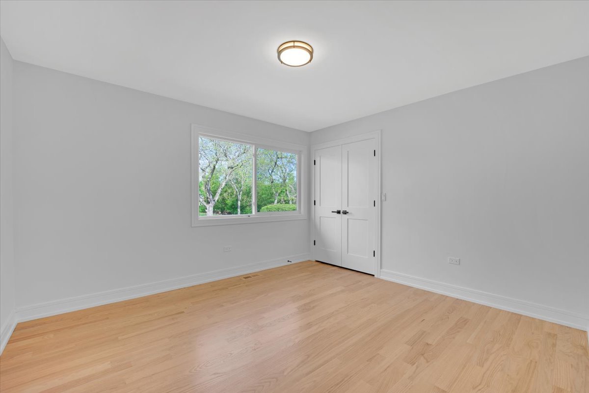 101 Devonshire Road, Unit 1 Tower Lakes, IL 60010 - Photo 23 of 38 a view of an empty room with a window