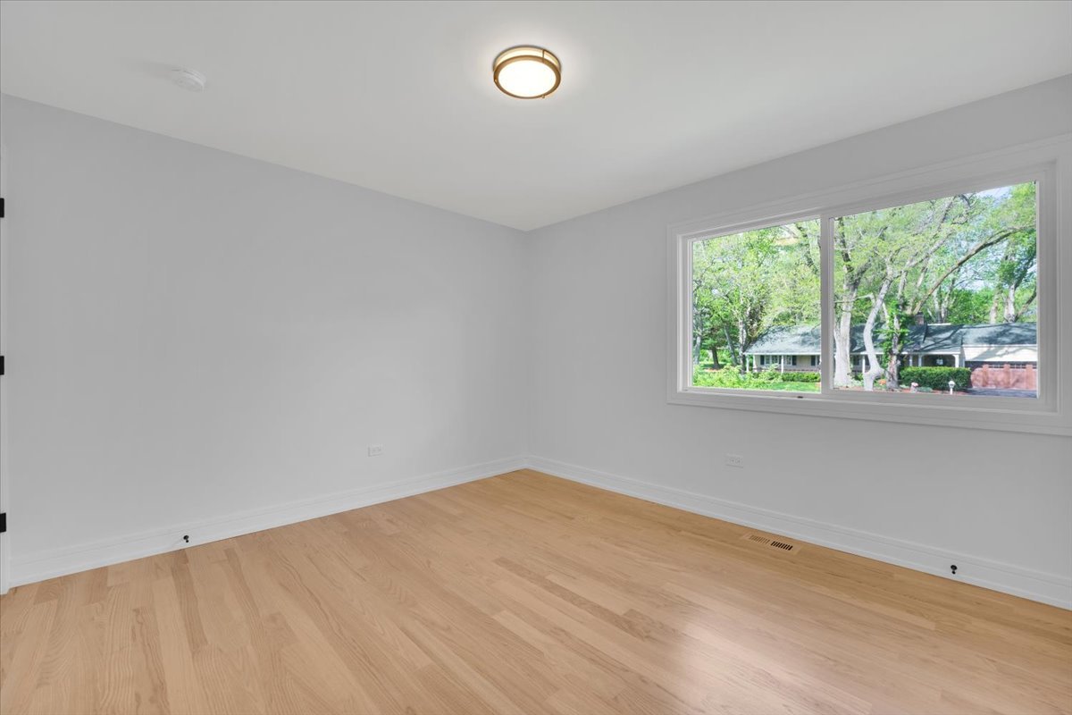 101 Devonshire Road, Unit 1 Tower Lakes, IL 60010 - Photo 24 of 38 an empty room with a window