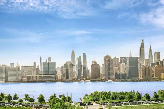 a view of a city with tall buildings