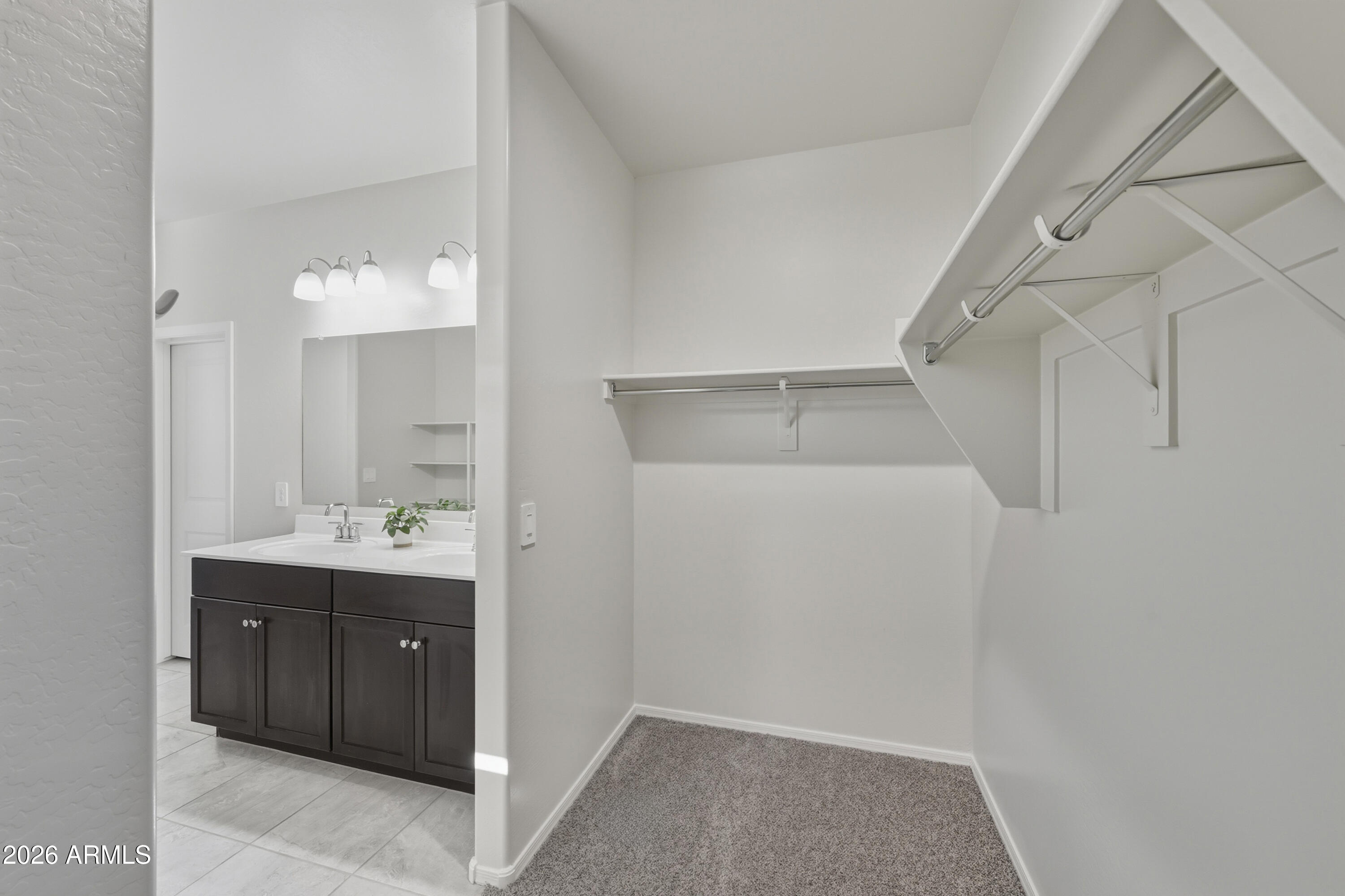 24136 Plow Road Florence, AZ 85132 - Photo 15 of 23 a bathroom with a sink and mirror