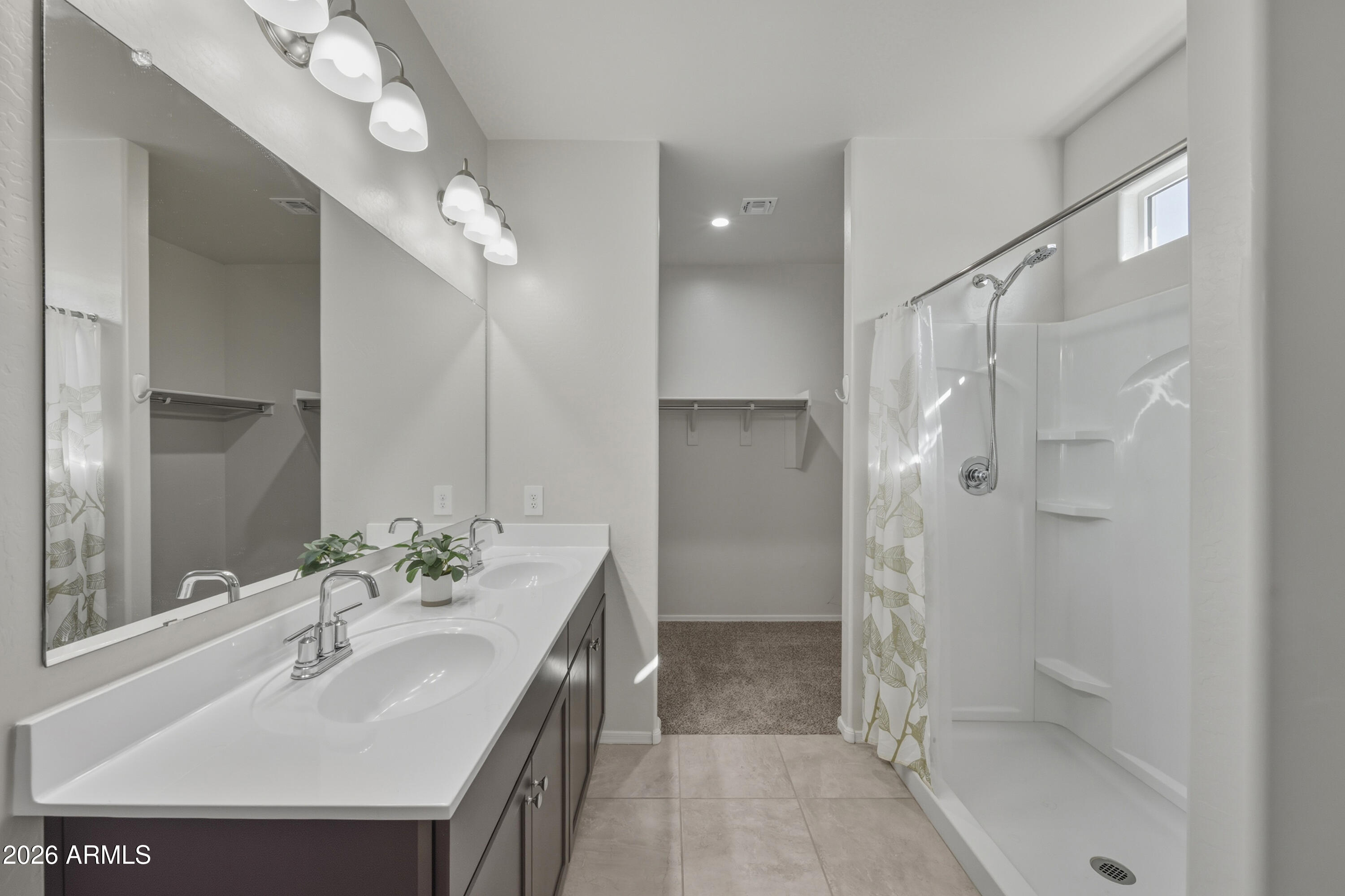 24136 Plow Road Florence, AZ 85132 - Photo 16 of 23 a bathroom with a sink shower and a mirror