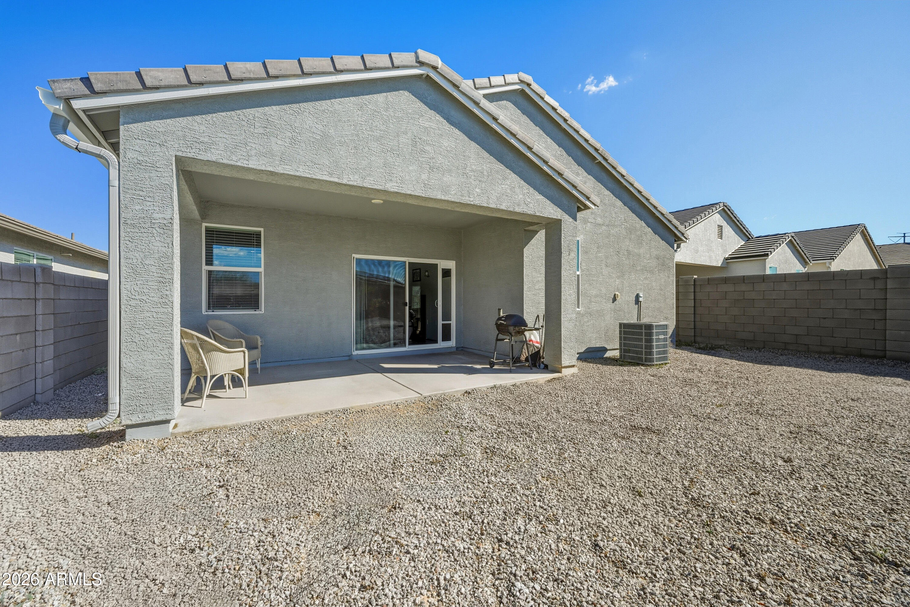 24136 Plow Road Florence, AZ 85132 - Photo 20 of 23 a front view of a house with a yard
