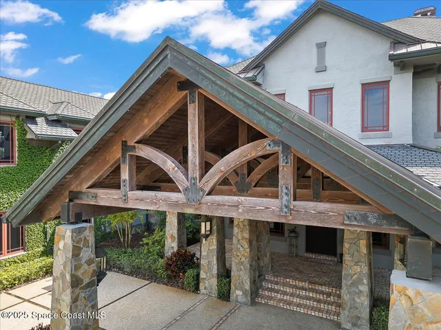 a view of a swimming pool with an outdoor seating
