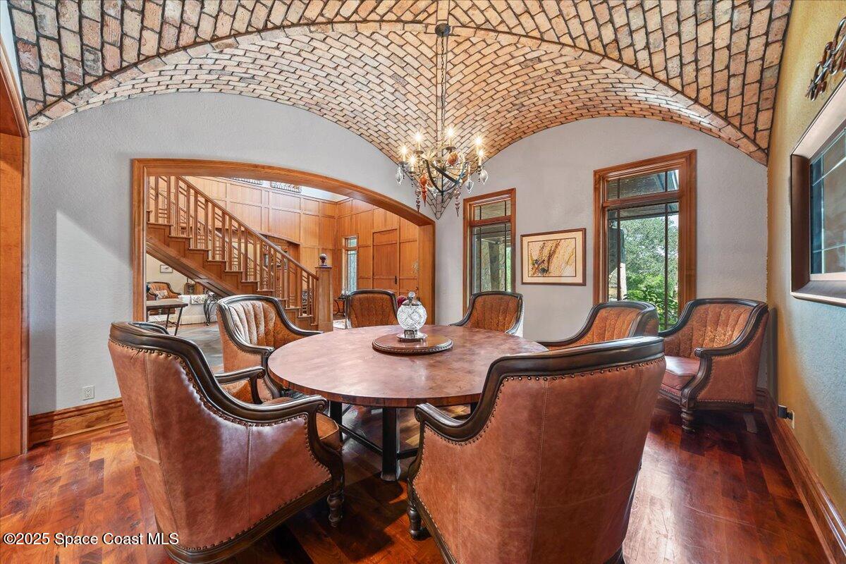 586 Wethersfield Place Melbourne, FL 32940 - Photo 21 of 112 a view of a dining room with furniture window and wooden floor