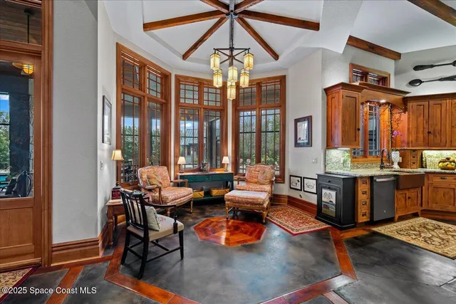a living room with furniture and a rug