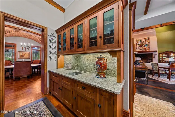 a bedroom with two beds and a table