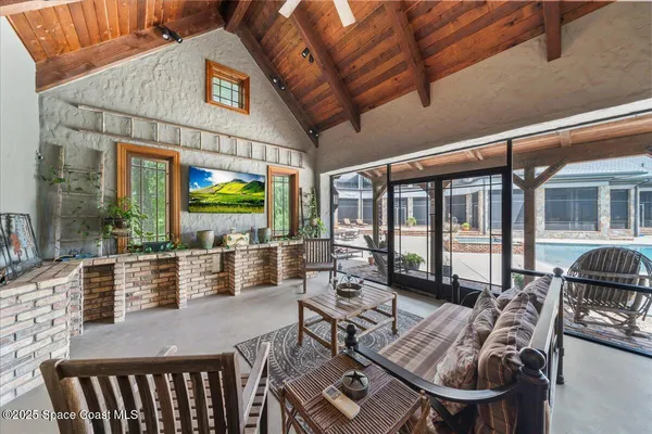 an aerial view of a house with a garden