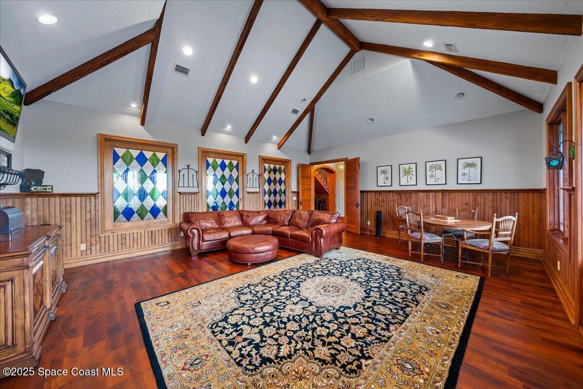 586 Wethersfield Place Melbourne, FL 32940 - Photo 75 of 112 a living room with furniture and a rug