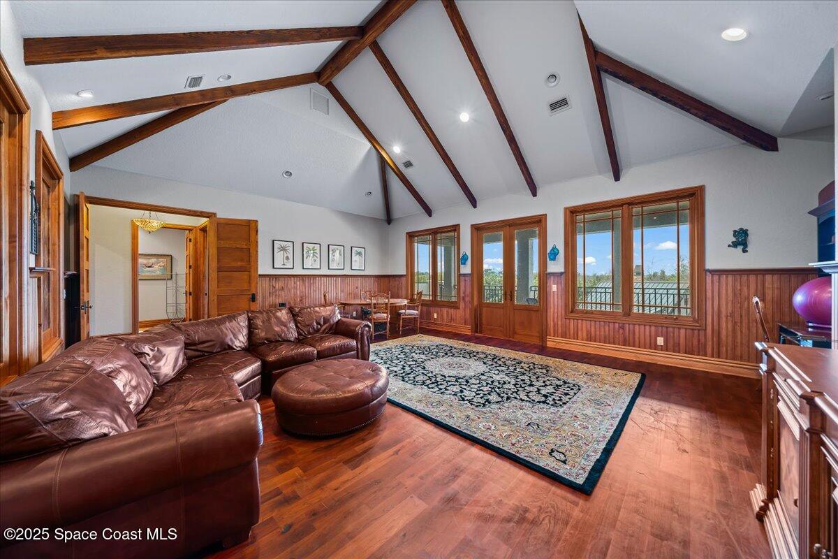 586 Wethersfield Place Melbourne, FL 32940 - Photo 78 of 112 a living room with furniture and a rug
