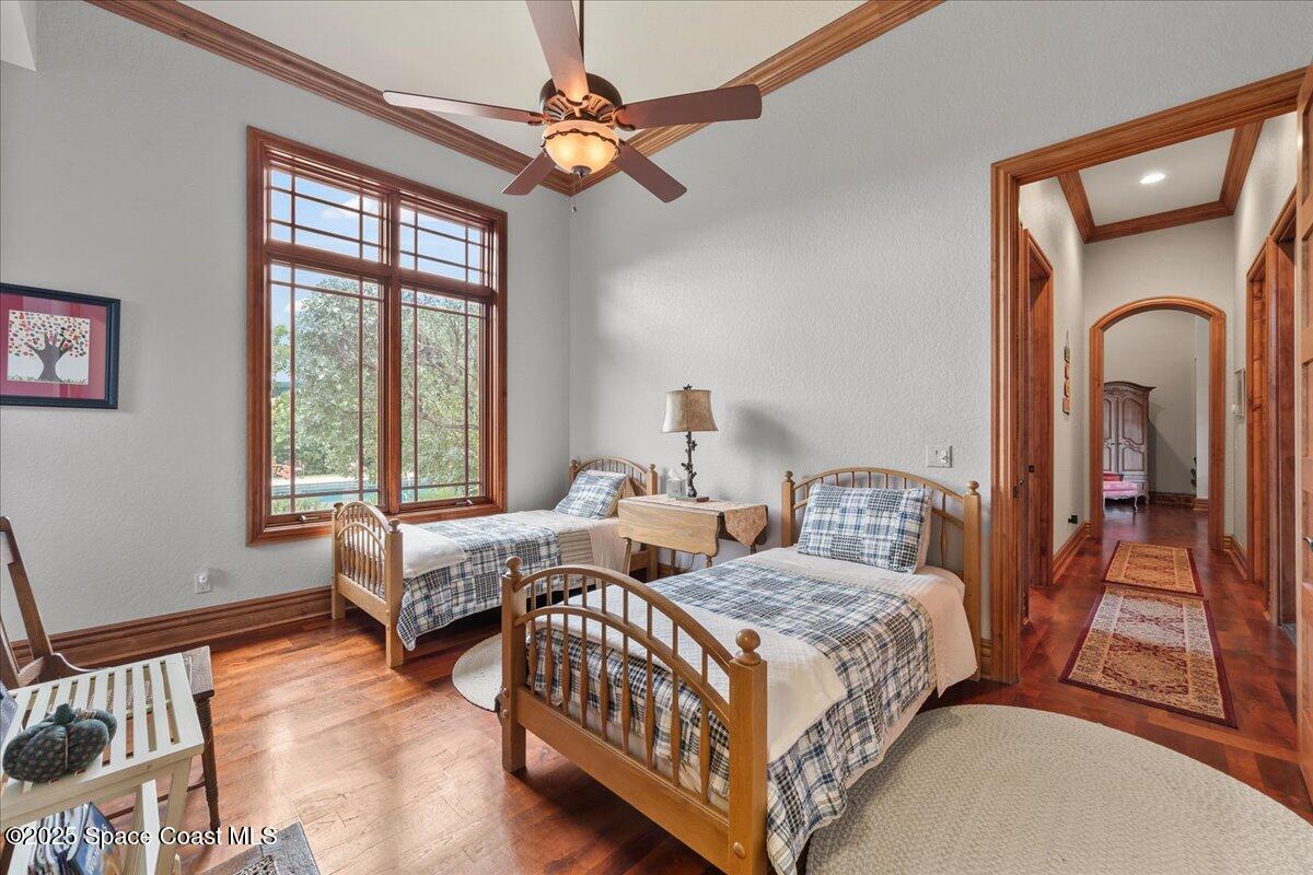 586 Wethersfield Place Melbourne, FL 32940 - Photo 89 of 112 a bedroom with two beds and a window