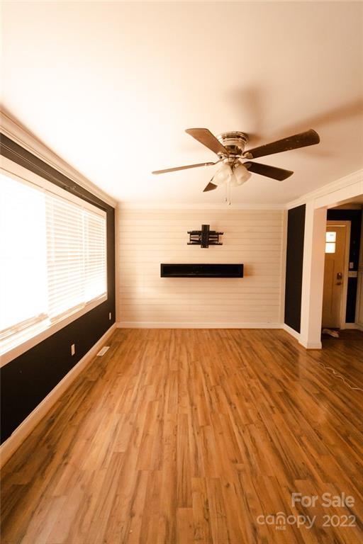 20450 Indian Mound Road Albemarle, NC 28001 - Photo 14 of 14 a view of a ceiling fan and wooden floor
