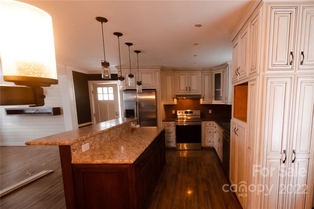 20450 Indian Mound Road Albemarle, NC 28001 - Photo 5 of 14 a kitchen with refrigerator and window