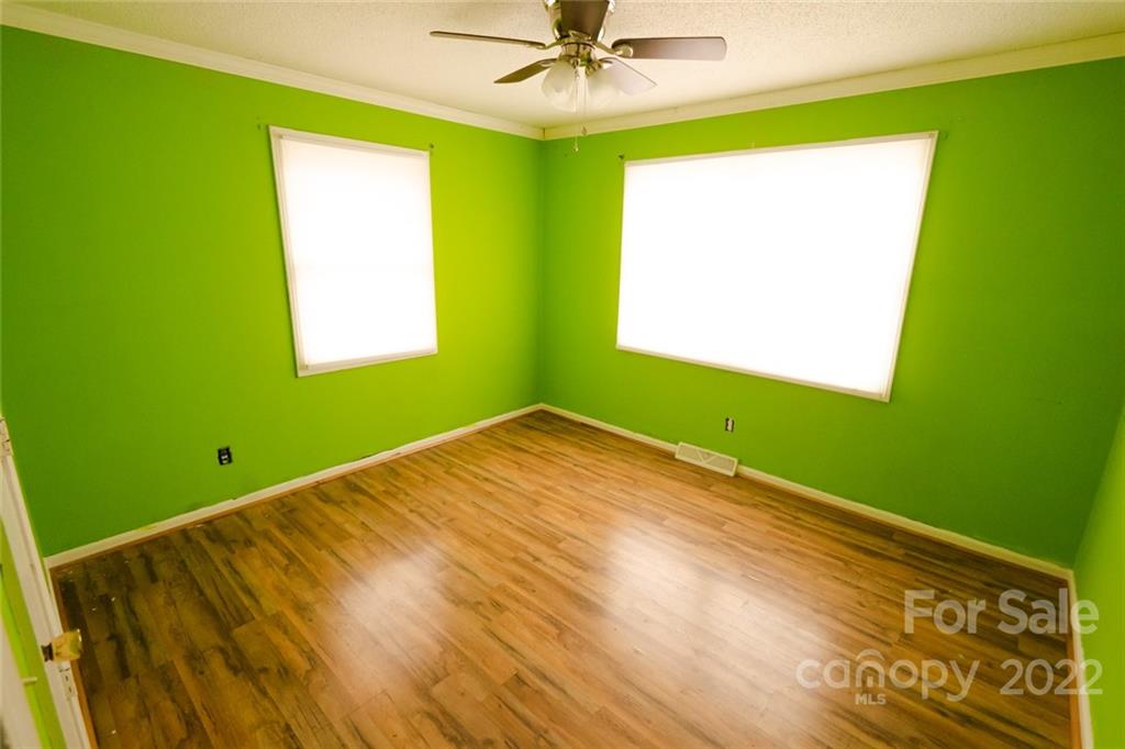 20450 Indian Mound Road Albemarle, NC 28001 - Photo 9 of 14 a view of empty room with window and fan