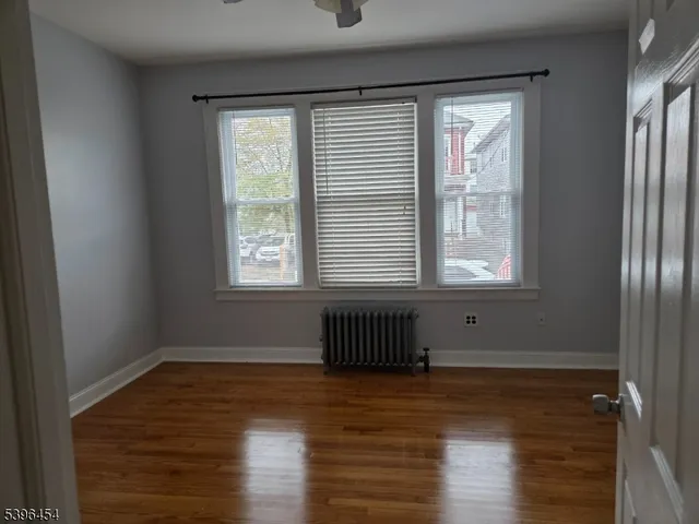 wooden floor and cabinet in a kitchen