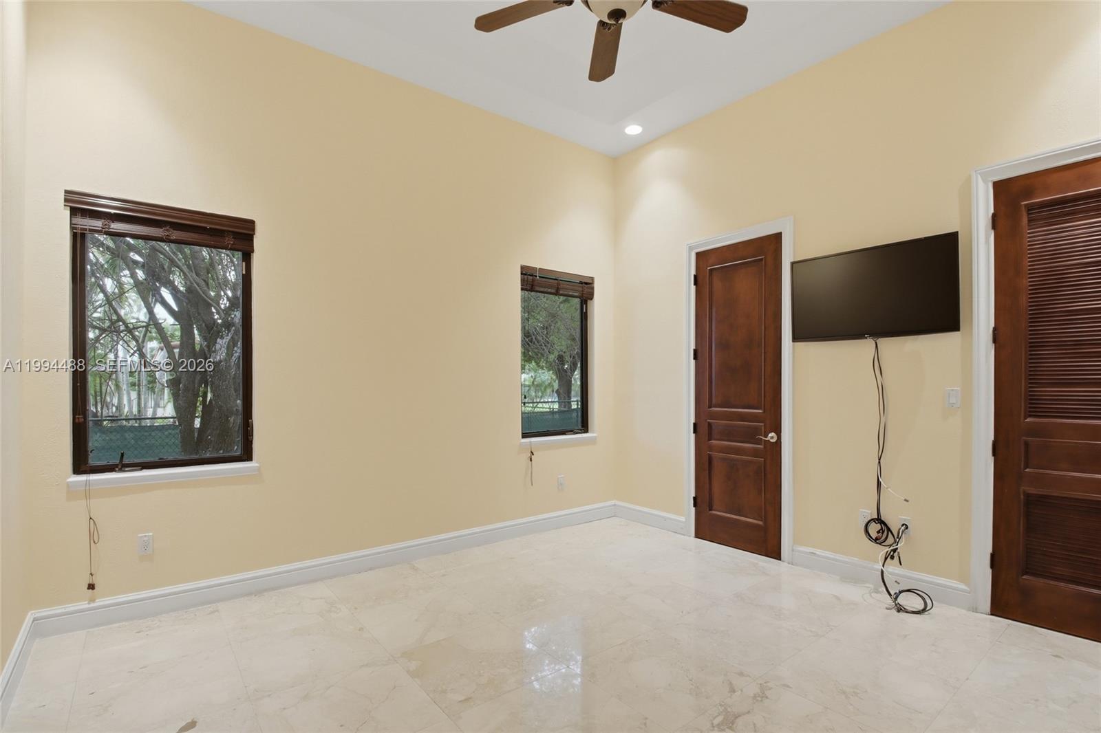 6200 Southwest 97th Avenue Miami, FL 33173 - Photo 26 of 48 Bedroom with integrated bathroom and walk in closet