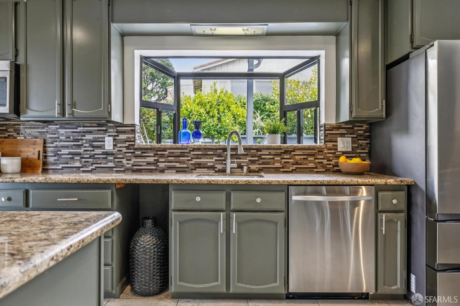545 Talbot Avenue Pacifica, CA 94044 - Photo 34 of 87 a kitchen with stainless steel appliances granite countertop a sink and a window