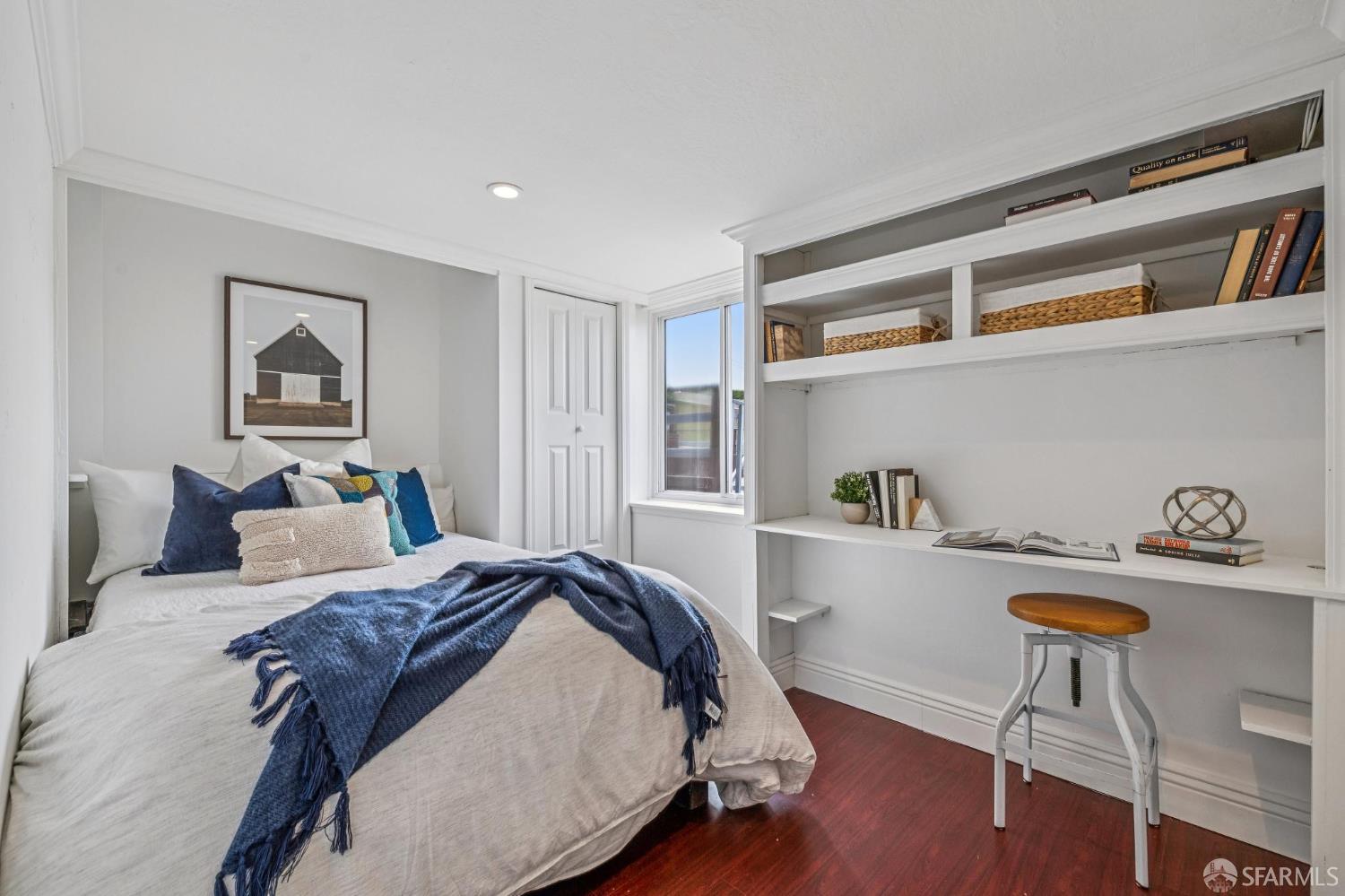 545 Talbot Avenue Pacifica, CA 94044 - Photo 60 of 87 a bedroom with a bed and a bookshelf