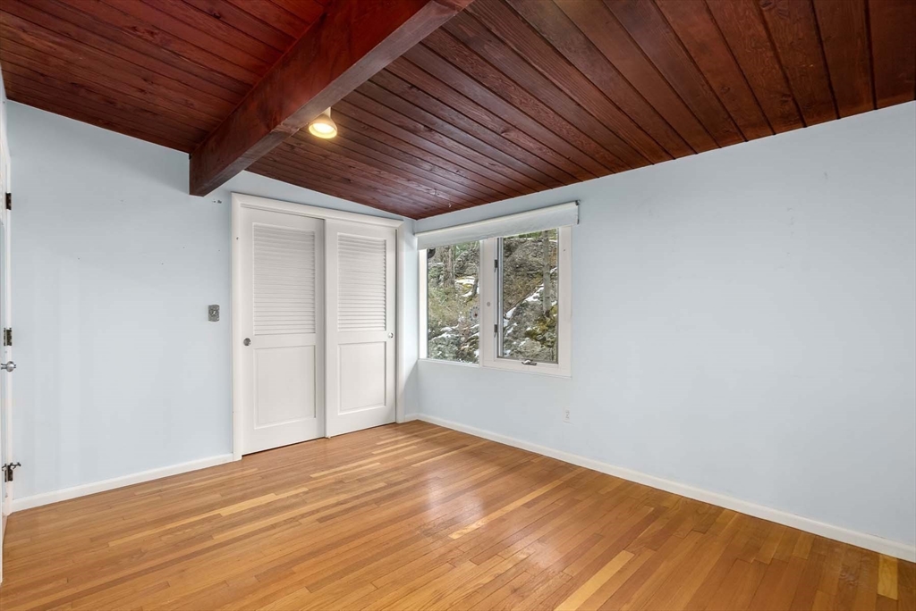 34 Bellingham Road Brookline, MA 02467 - Photo 24 of 33 a view of empty room with wooden floor
