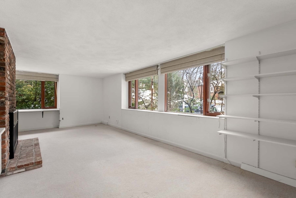 34 Bellingham Road Brookline, MA 02467 - Photo 30 of 33 an empty room with a window