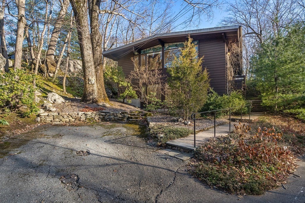 34 Bellingham Road Brookline, MA 02467 - Photo 3 of 33 a front view of a house with a yard