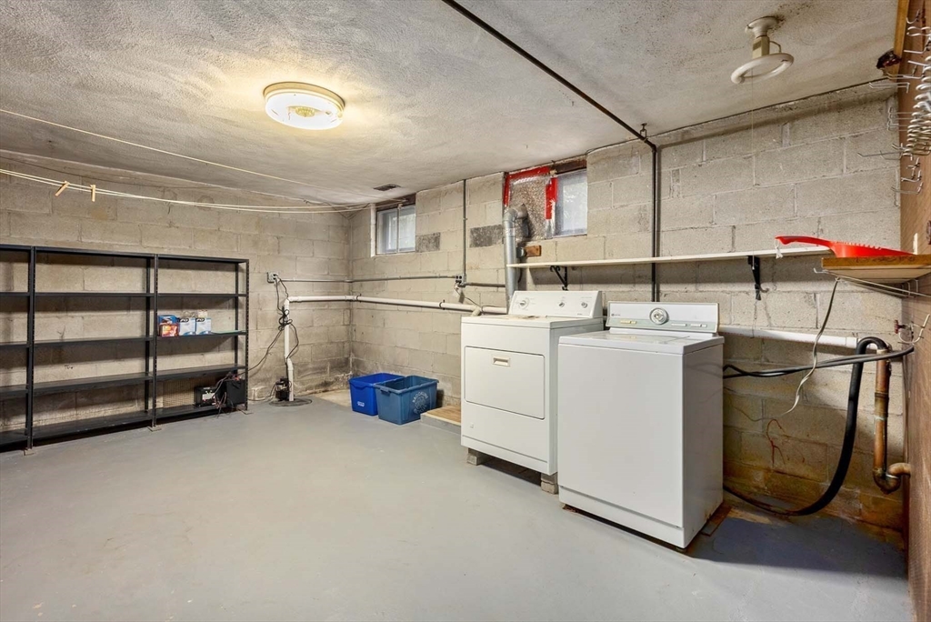 34 Bellingham Road Brookline, MA 02467 - Photo 33 of 33 a utility room with dryer and washer