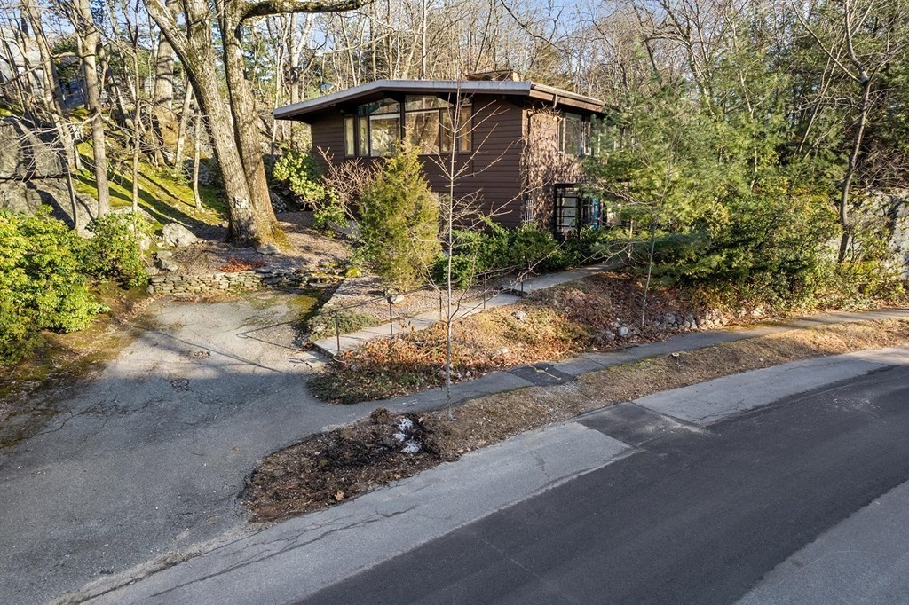 34 Bellingham Road Brookline, MA 02467 - Photo 4 of 33 a front view of a house with a yard