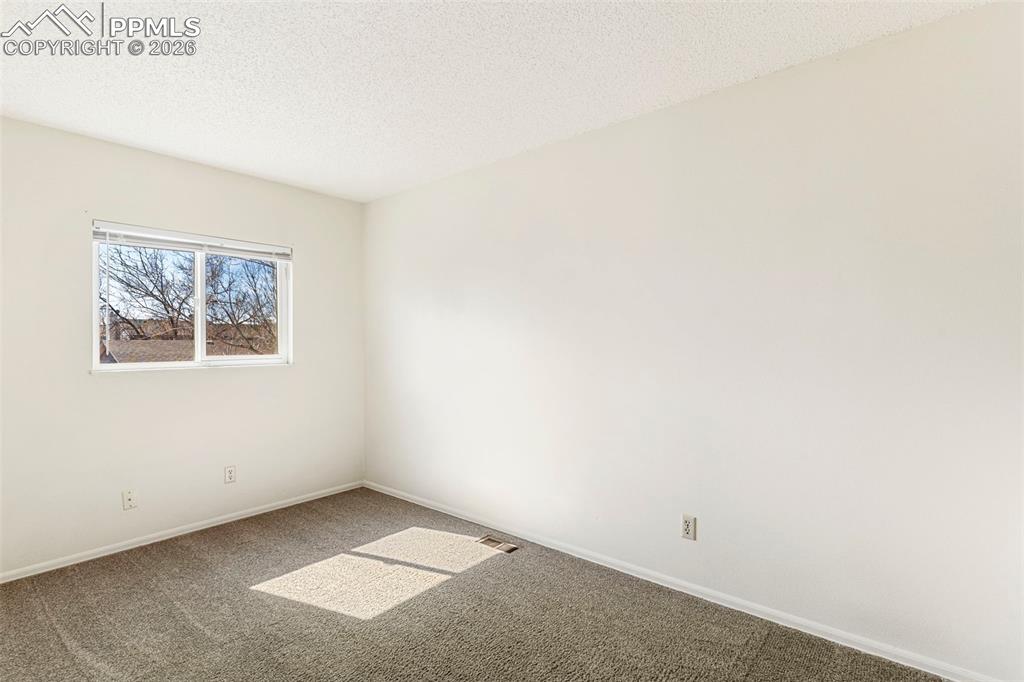6745 Parkridge Court Colorado Springs, CO 80915 - Photo 18 of 23 a view of an empty room