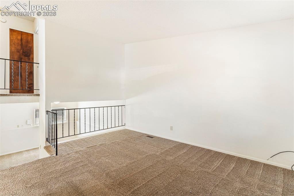 6745 Parkridge Court Colorado Springs, CO 80915 - Photo 3 of 23 a view of a livingroom with entryway