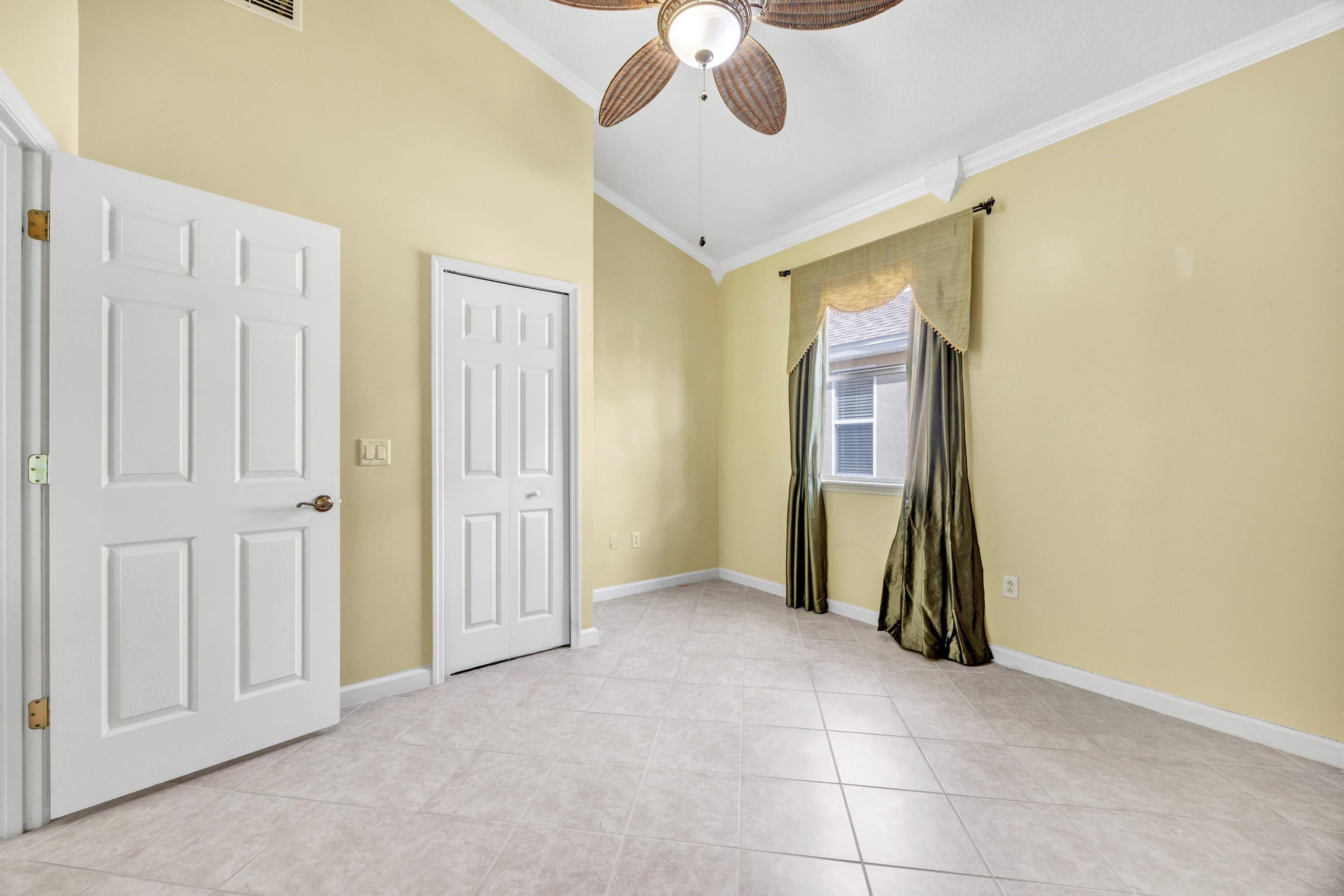 608 Copperhead Circle St. Augustine, FL 32092 - Photo 30 of 65 The center bedroom faces west, is closeted, has french doors and can be used as a study or as another bedroom.