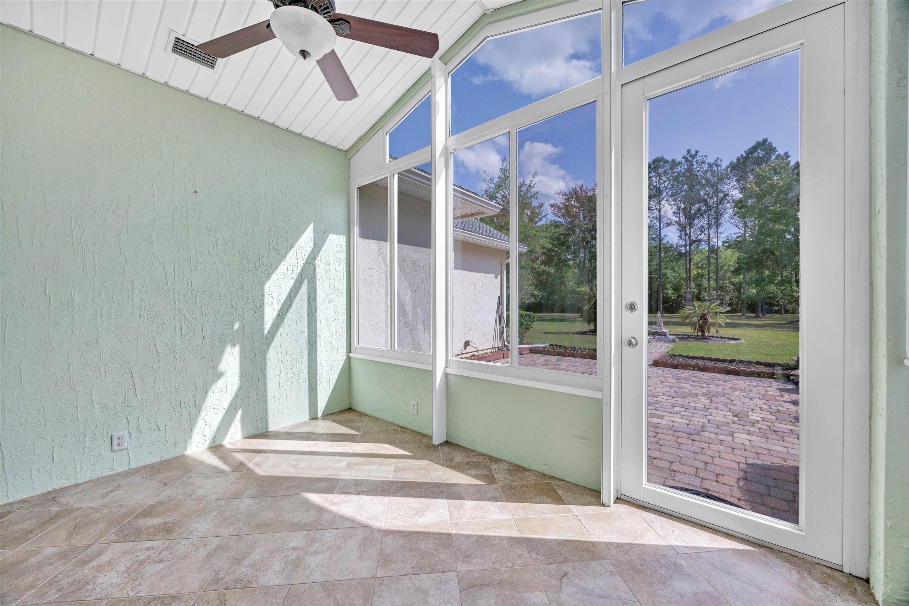 608 Copperhead Circle St. Augustine, FL 32092 - Photo 36 of 65 The air conditioned lanai has been fully enclosed with custom black out shades. It will become your treasured hideway!