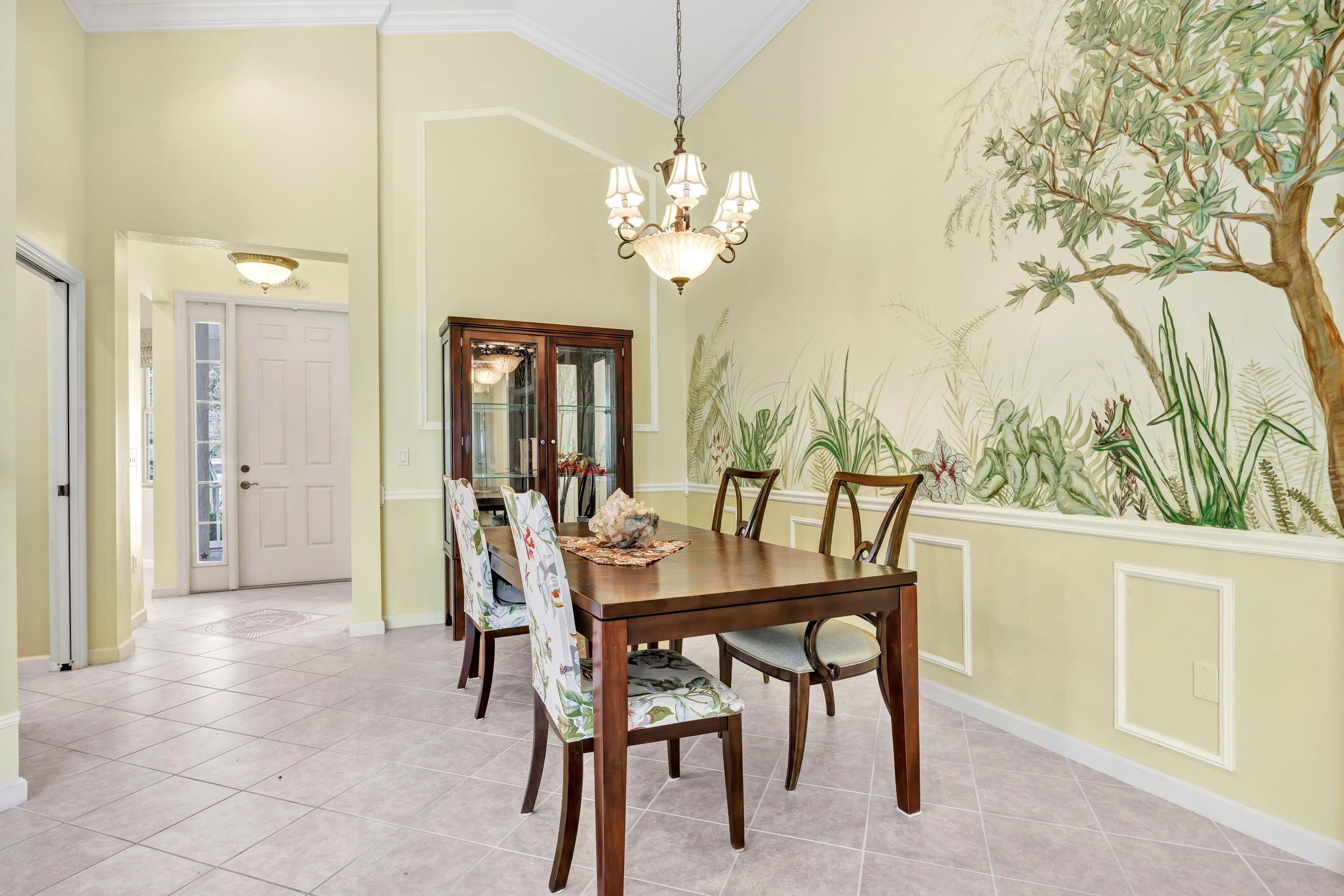 608 Copperhead Circle St. Augustine, FL 32092 - Photo 9 of 65 Facing toward the front door, large space for dining and china cabinet. Custom mural.