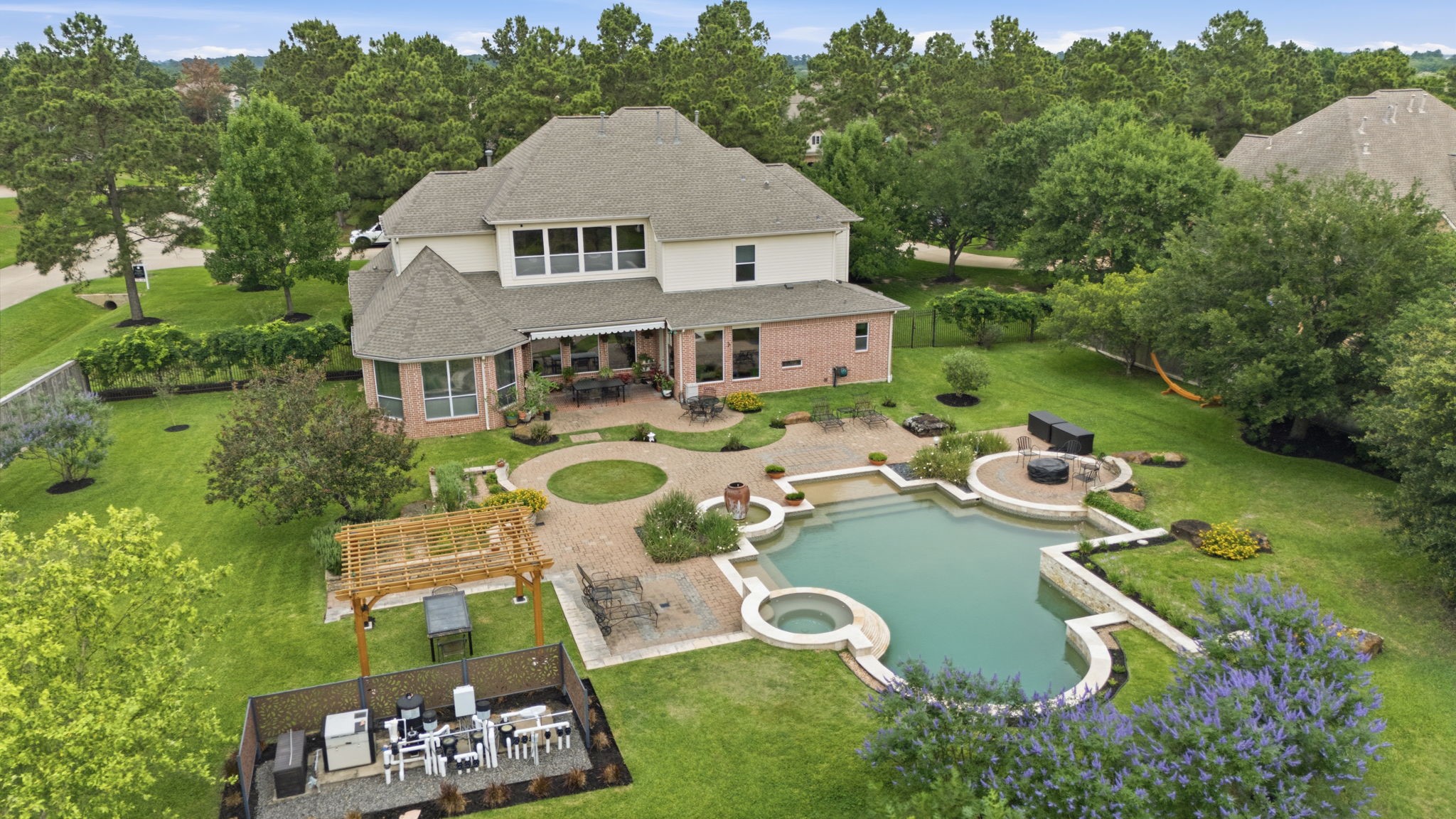 15 White Meadow Court Spring, TX 77379 - Photo 11 of 43 Pool offers a full functional heater for pool and spa and is sheltered by a fence. Fountain