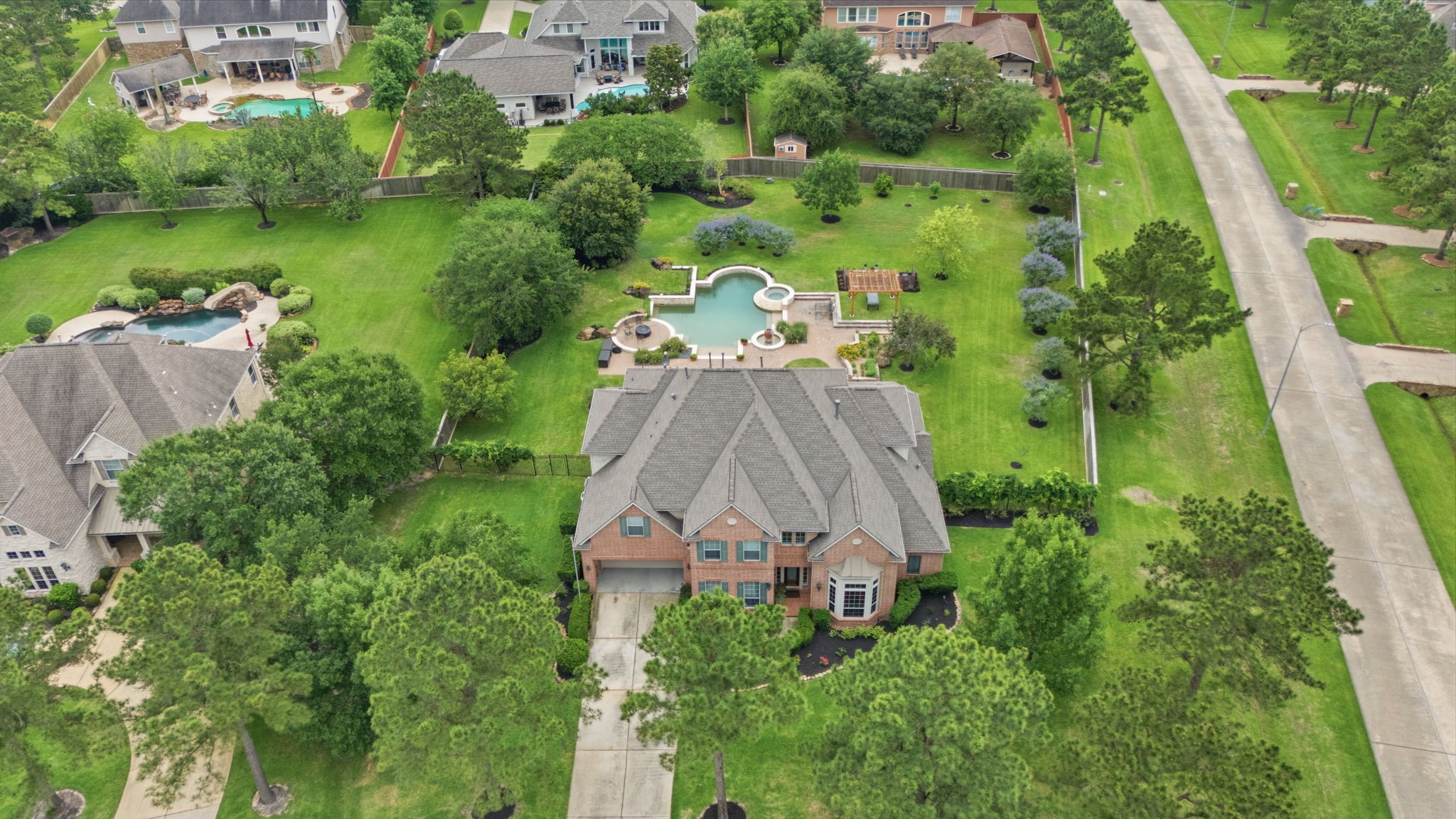 15 White Meadow Court Spring, TX 77379 - Photo 9 of 43 24 KW Generac generator is located near garage on left side o the home away from bedrooms