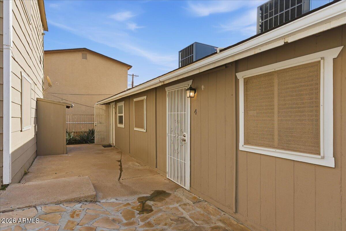 451 East 10th Avenue Apache Junction, AZ 85119 - Photo 15 of 21 a view of a house with a backyard