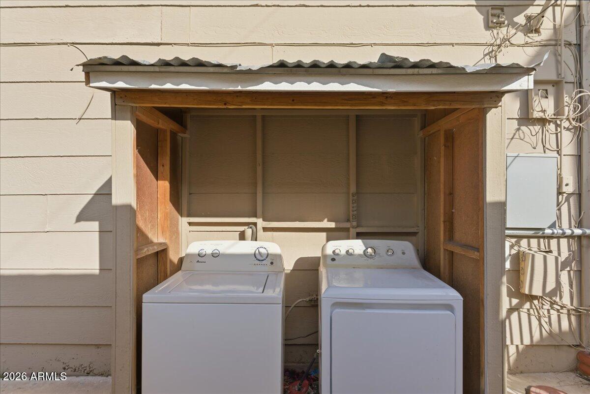 451 East 10th Avenue Apache Junction, AZ 85119 - Photo 21 of 21 a utility room with dryer and washer