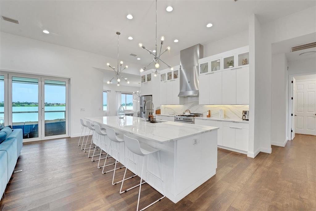 5911 Old Berkley Road Auburndale, FL 33823 - Photo 17 of 91 a large kitchen with a large island in it