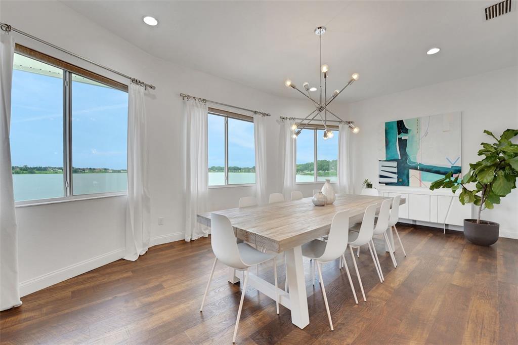 5911 Old Berkley Road Auburndale, FL 33823 - Photo 21 of 91 a view of a dining room with furniture window and wooden floor