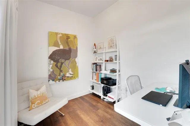 a view of a storage & utility room with a window