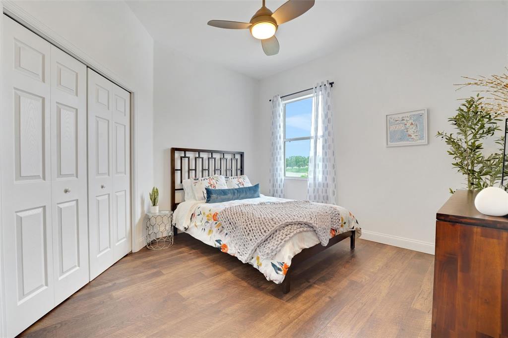 5911 Old Berkley Road Auburndale, FL 33823 - Photo 39 of 91 a bedroom with a bed and a window