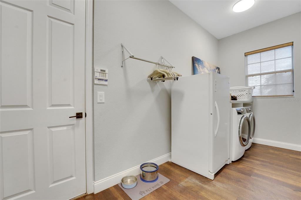 5911 Old Berkley Road Auburndale, FL 33823 - Photo 42 of 91 a view of a storage & utility room with a window