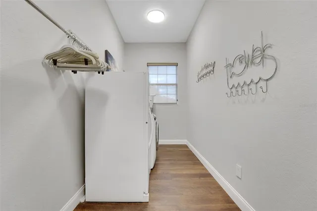 a view of a lake with a yard