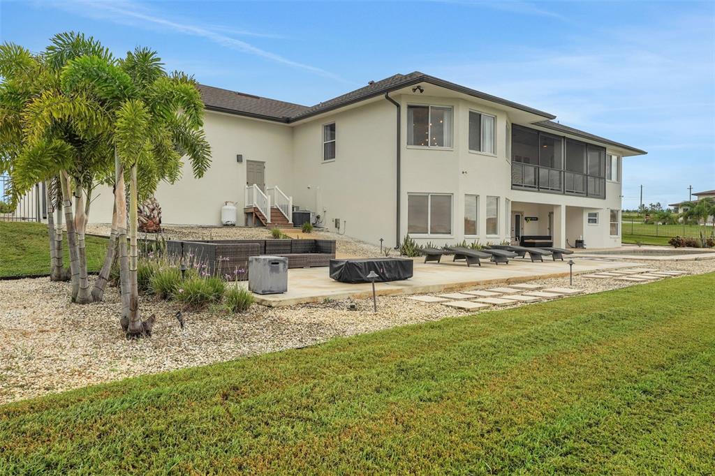 5911 Old Berkley Road Auburndale, FL 33823 - Photo 67 of 91 a front view of a house with swimming pool