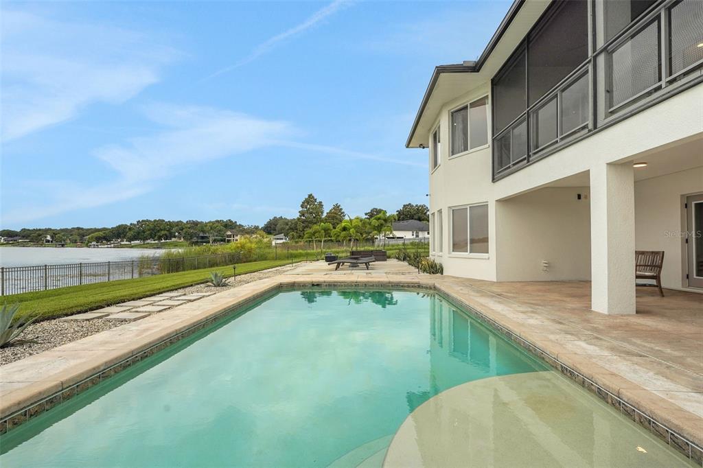 5911 Old Berkley Road Auburndale, FL 33823 - Photo 76 of 91 a view of a house with a swimming pool