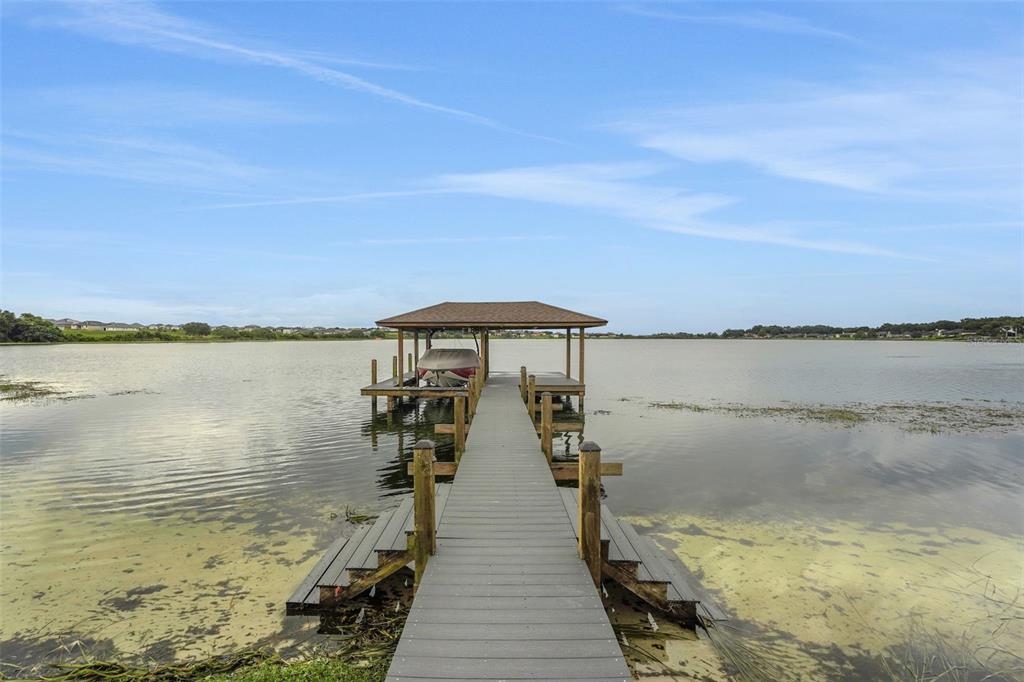 5911 Old Berkley Road Auburndale, FL 33823 - Photo 79 of 91 a view of a lake with a outdoor space