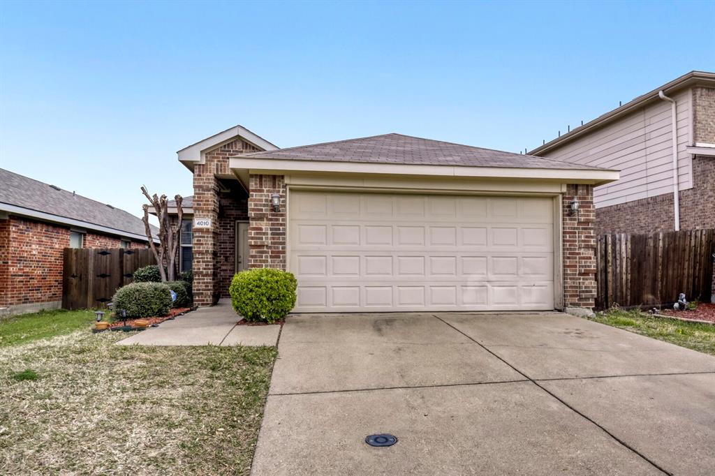 4010 Ridgetop Drive Heartland, TX 75126 - Photo 1 of 1 a front view of a house with garden
