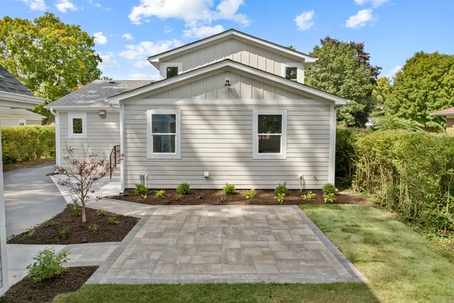 a front view of a house with yard