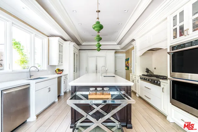 a view of a hallway view with living room and dining room